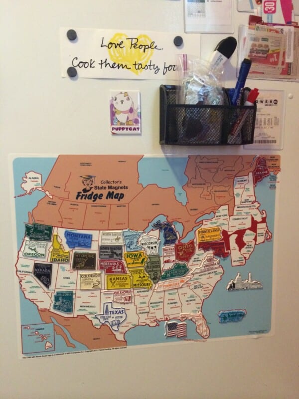 state magnets and map on the fridge