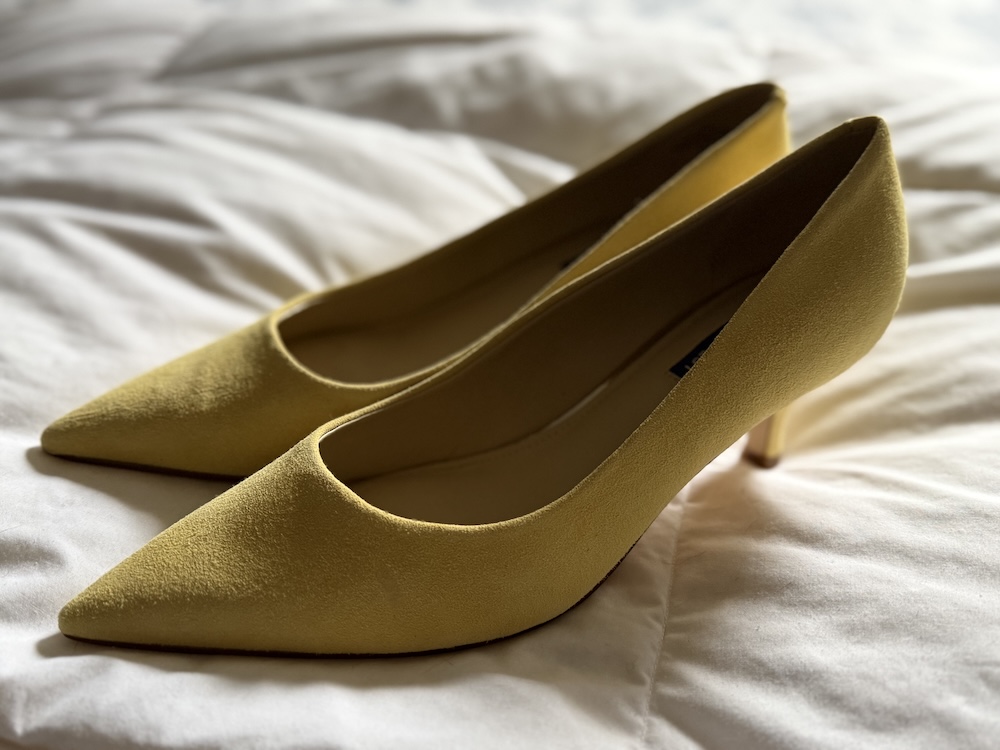 lemon yellow kitten heels worn at a writers workshop, symbolizing confidence and personal style